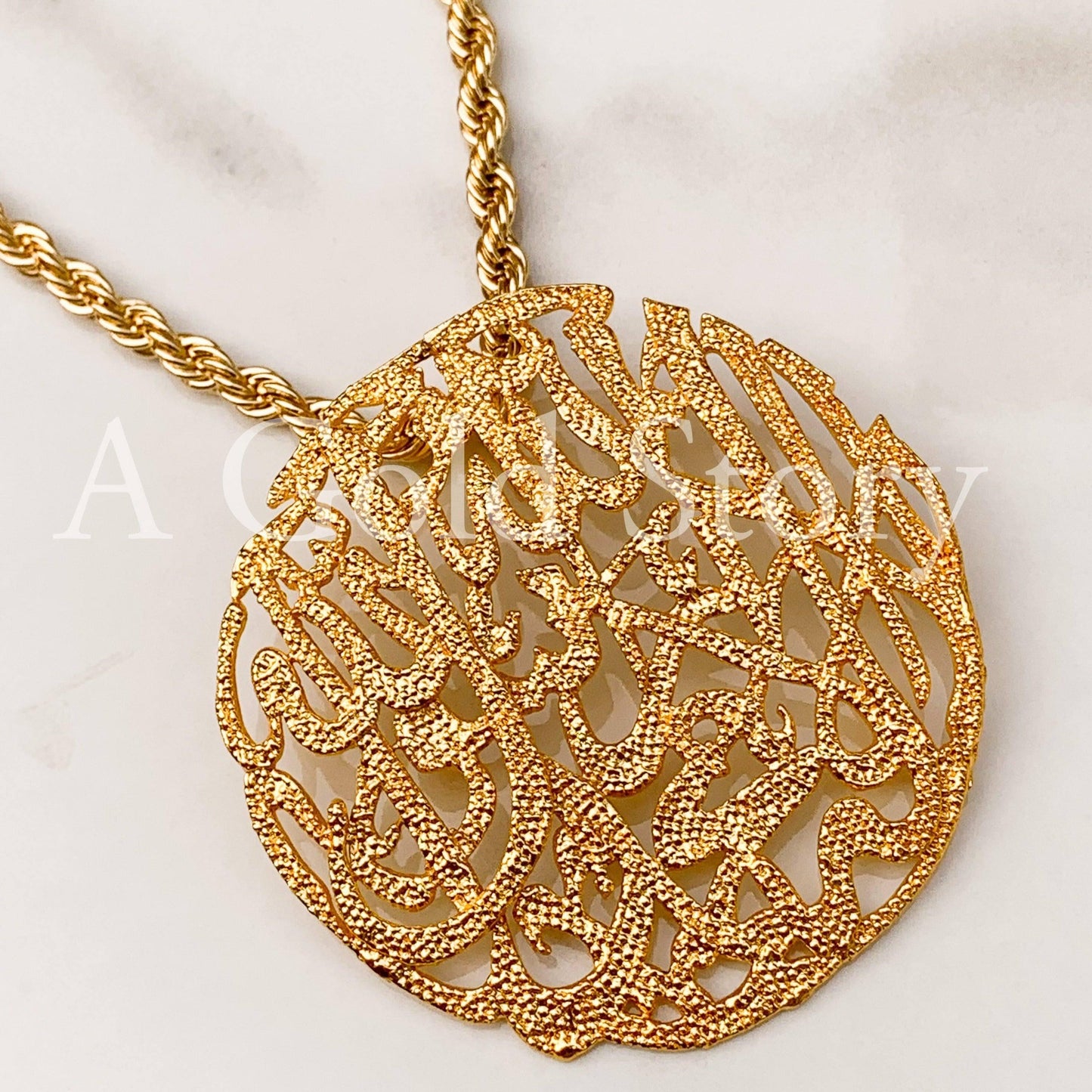 QALMA PENDANT - A GOLD STORY