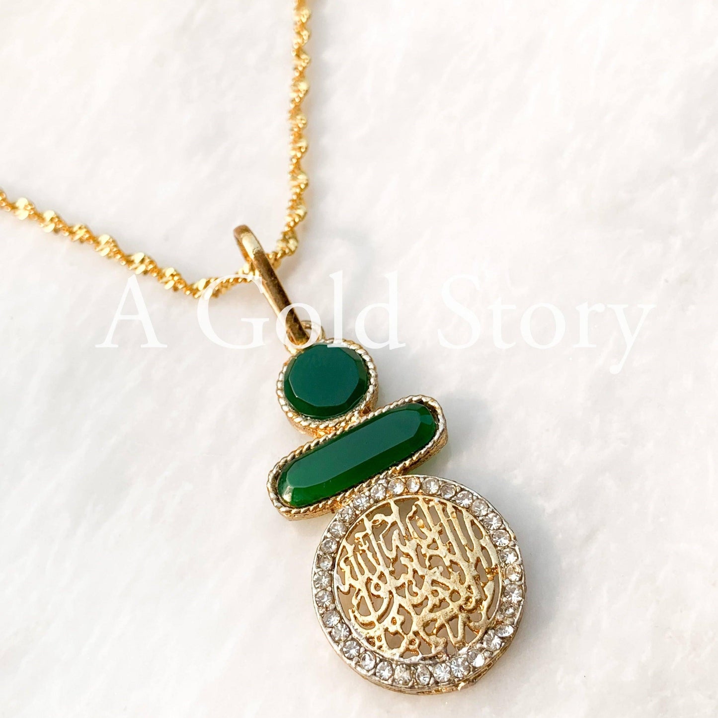 QALMA PENDANT - A GOLD STORY