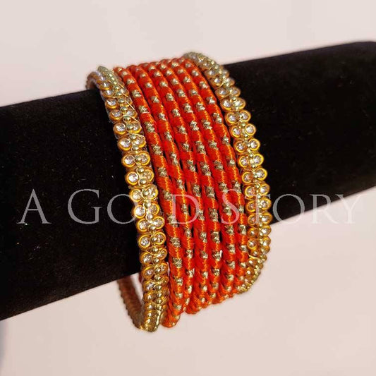 METAL RIBBON BANGLES ORANGE - A GOLD STORY