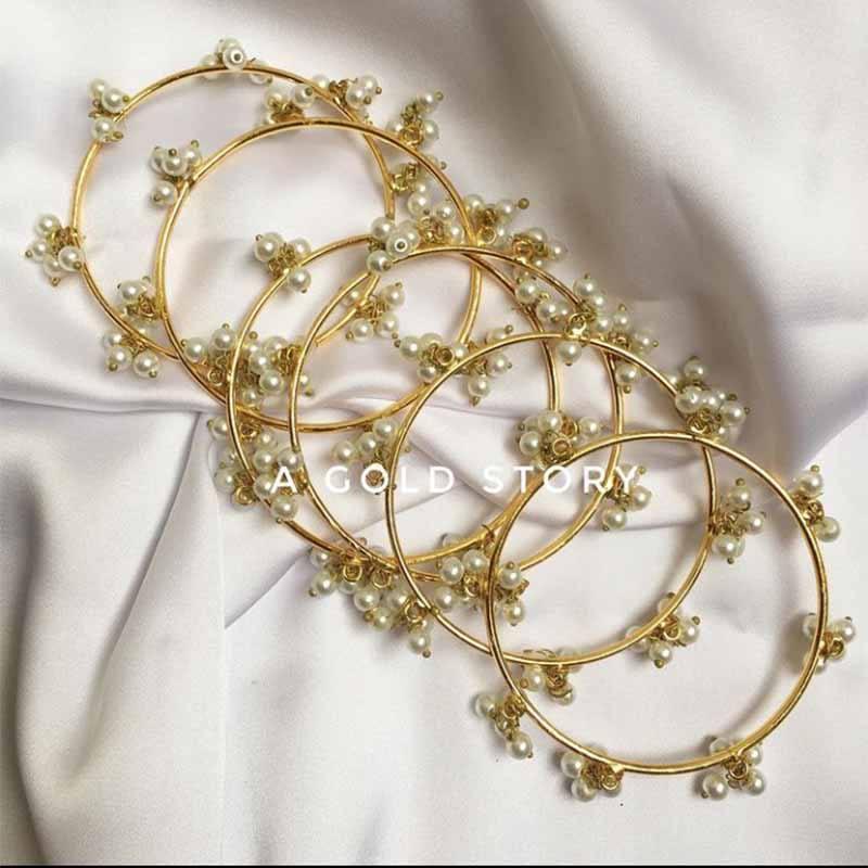 PEARL BANGLES - A GOLD STORY