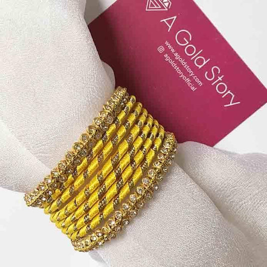 METAL RIBBON BANGLES YELLOW - A GOLD STORY