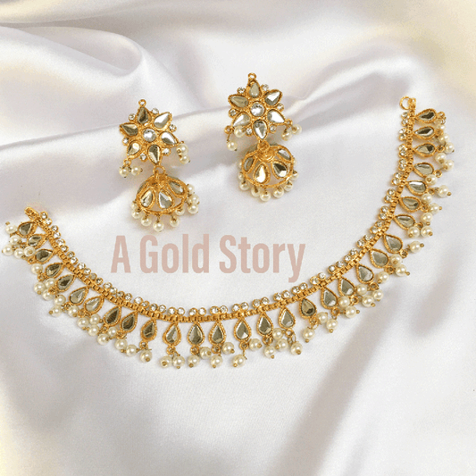 DELICATE KUNDAN SET - A GOLD STORY